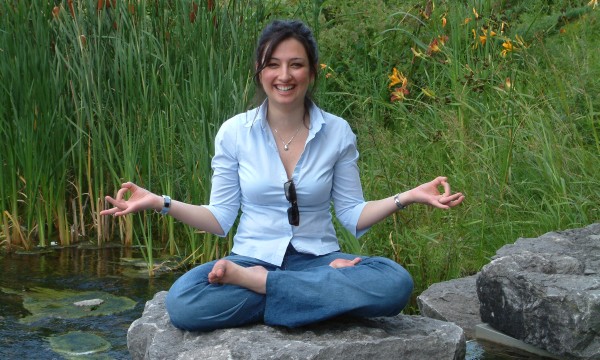 Women meditating outdoors